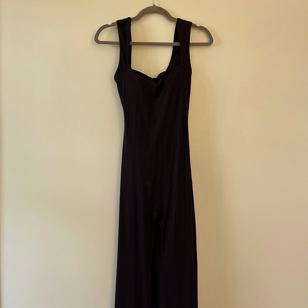 workout romper- open back, black, flared leggings
